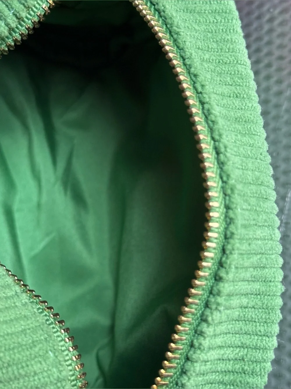 Tata Harper small green corduroy makeup bag
